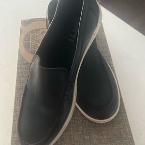 Men’s leather slip on loafer with rubber soles. Brand new in original box.